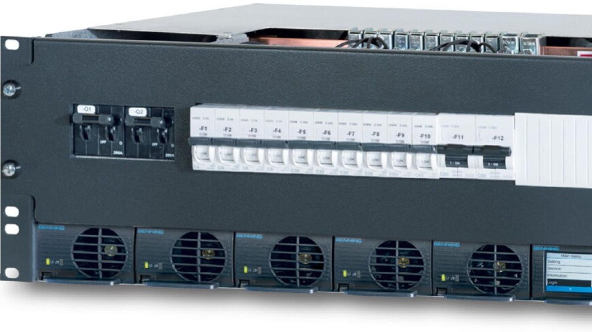 Close-up of a server rack-mounted power distribution unit (PDU) with multiple circuit breakers and several cooling fans visible at the bottom front. The unit is housed in a black metal enclosure.