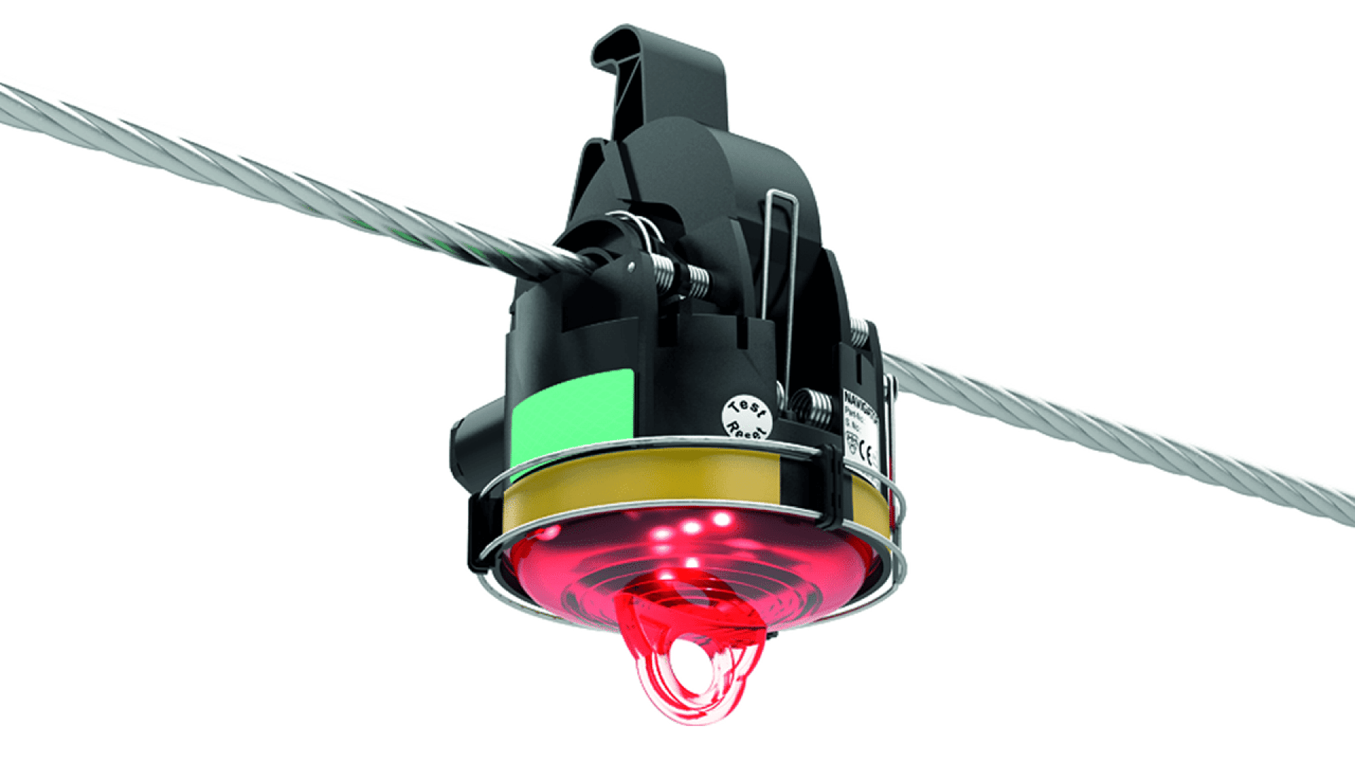 Nahaufnahme eines schwarz-gelben elektronischen Geräts mit grünen und roten Anzeigeleuchten, das an einem Stahlkabel befestigt ist. Unter dem Gerät leuchten rote LED-Leuchten, die den Betrieb oder die Signalübertragung anzeigen.
