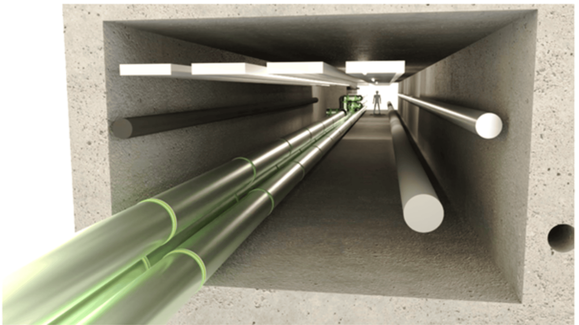 Eine perspektivische Ansicht des Inneren eines Betontunnels mit mehreren großen Rohren und Kabeln, die an den Wänden entlanglaufen; in der Ferne ist eine Person zu erkennen.