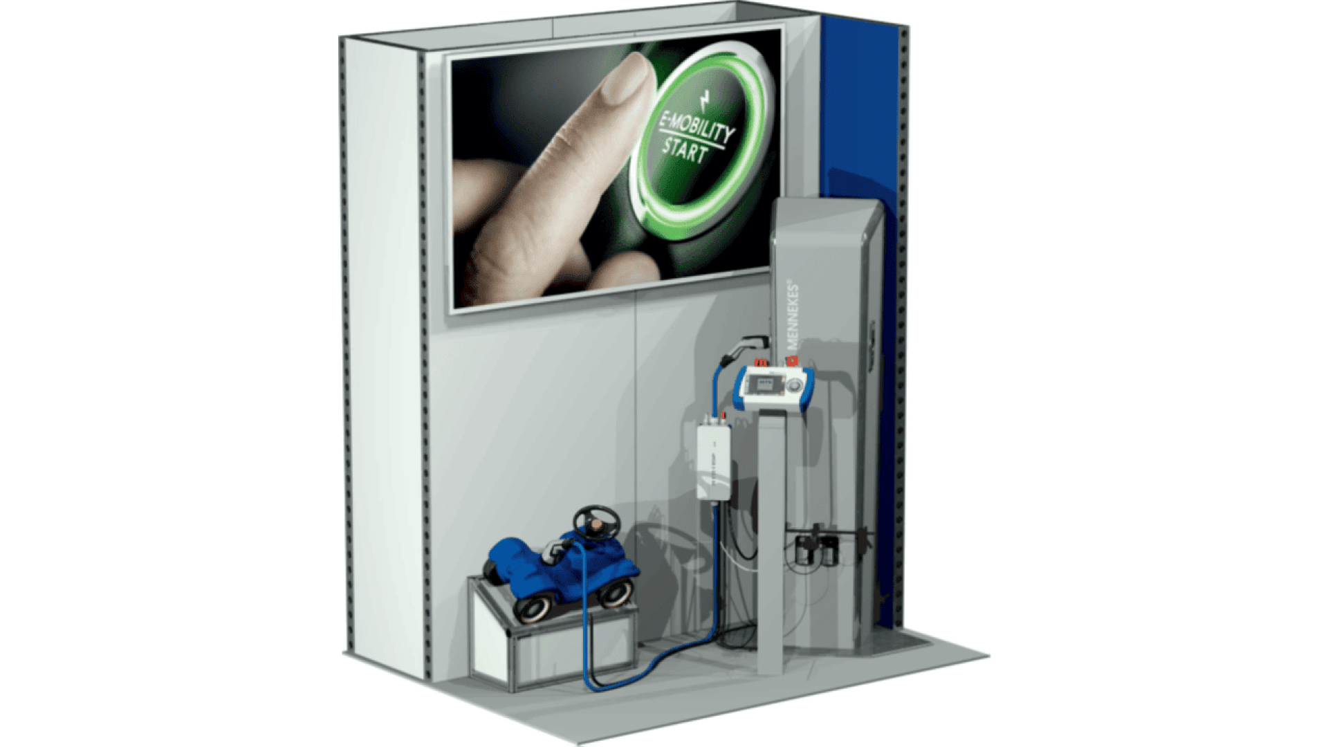 A display booth features a large screen showing a finger pressing a green EMOBILITY START button. Below, a blue toy car is attached to an electric vehicle charging station with cables.