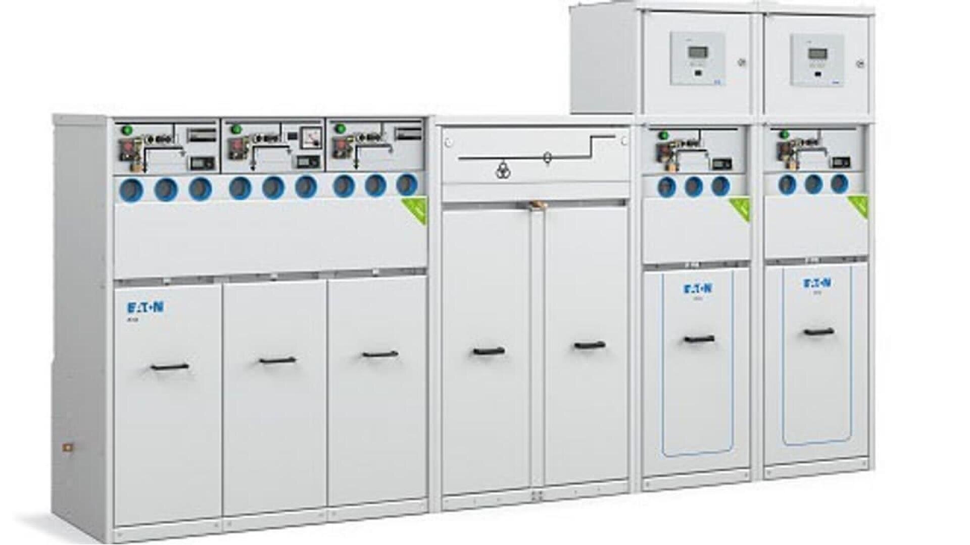A row of white electrical switchgear cabinets with control panels, switches, meters, and labeled Eaton branding, used for managing and protecting electrical circuits.