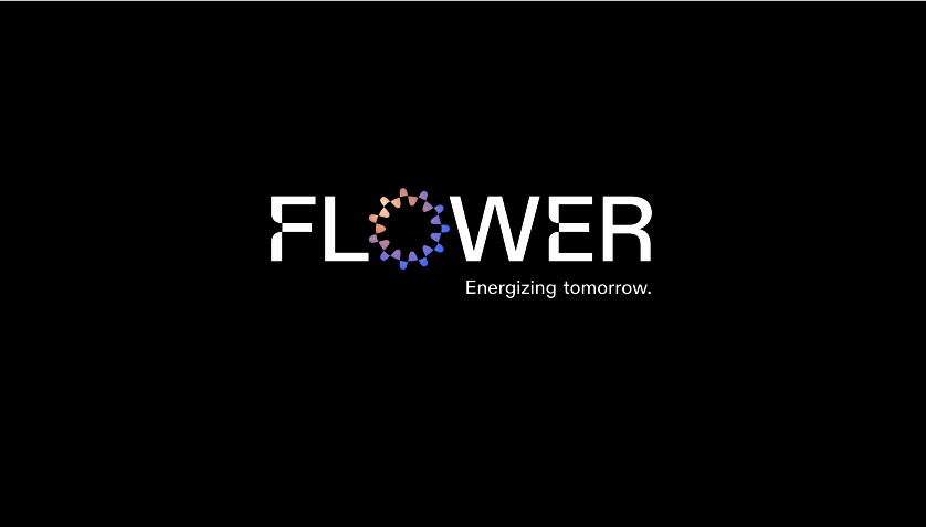 The word FLOWER in white text on a black background, with the O formed by multicolored petals in a circular pattern. Below, the slogan reads: Energizing tomorrow.