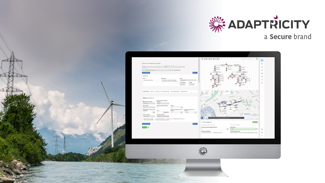 A computer monitor displays Adaptiricity’s energy network management software, set against a backdrop featuring power lines, wind turbines, mountains, and cloudy skies. The Adaptiricity logo appears in the upper right corner.