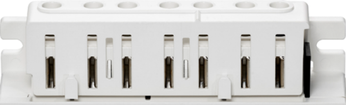 A close-up of a white electrical terminal block with multiple connection slots, viewed from the front, showing six vertical rectangular openings for wiring.